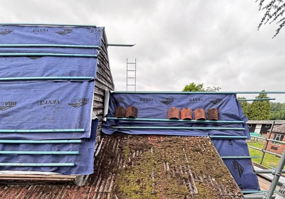 Moss-covered asbestos corrugated roof removal in Basingstoke