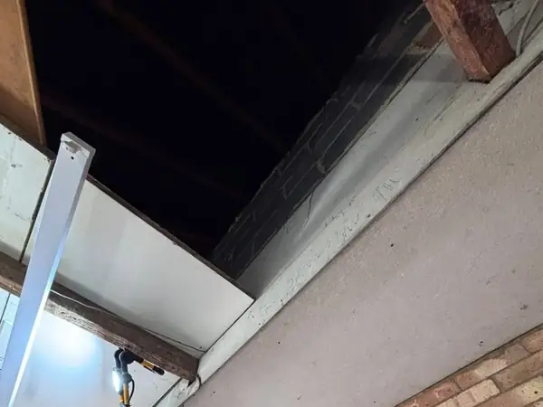 Asbestos cement boxing removed from a garage ceiling in Reading