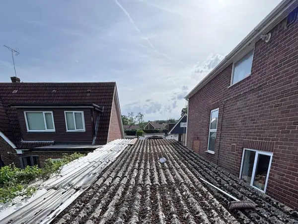 Long corrugated asbestos garage roof removal in Crowthorne