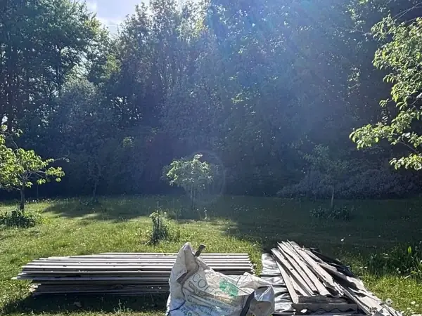 Corrugated asbestos sheets collected in Tadley