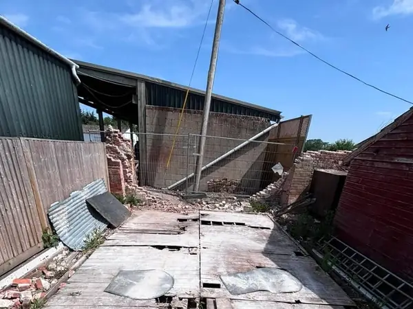 Excavated ground where asbestos sheets were found buried in soil in Newbury