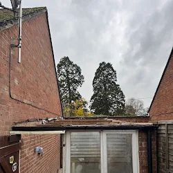 Asbestos soffit and facia boards on a house before removal