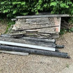 Asbestos roofing sheets stacked ready for licensed disposal